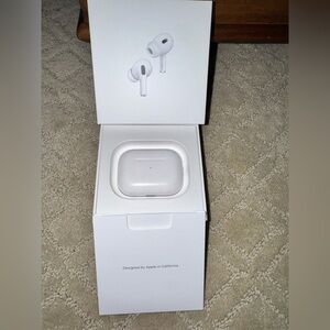 Apple AirPods Pro 2nd Generation with White Charging Case